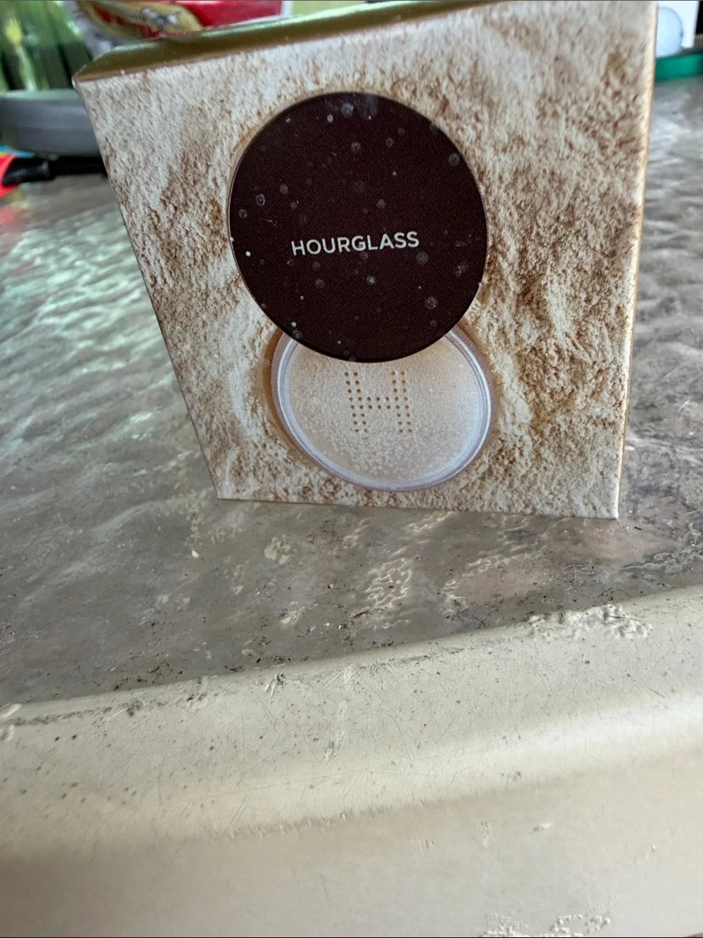 Hourglass Veil Translucent Setting Powder in Metallic Gold Packaging